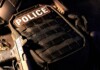 Built for the Mission: The Future of Custom Armor Systems Close-up of a police tactical vest with integrated body armor, highlighting modern ballistic protection equipment used by law enforcement in operational environments.