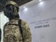 Hotter Than the Summer Sun: Eurosatory 2026 Brought the Heat A body armor displayed on a mannequin with a tactical helmet, set against backdrop featuring the message “Protecting those that protect us everyday.”